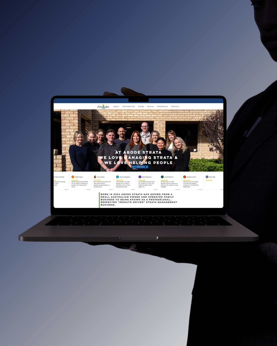 Abode Strata website design for a Perth strata management company, shown on a laptop